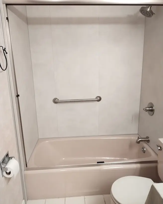 Tub Back in Service — Drain Master NJ Clean bathtub and shower surround draining perfectly after Drain Master NJ tub drain service in New Jersey