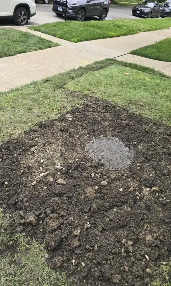 Drainage Access Restored and Regraded — Drain Master NJ Drainage system access point uncovered and yard regraded after service at a New Jersey home