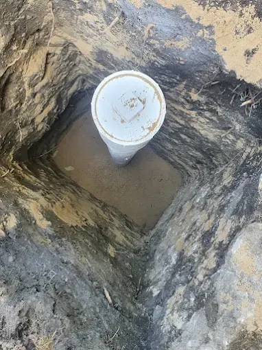 New Sewer Cleanout for Easy Maintenance Access — Drain Master NJ Newly installed PVC sewer cleanout in a small excavation, giving easy maintenance access at a New Jersey property