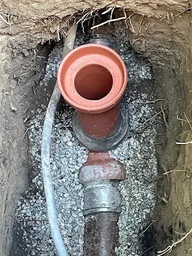 New Cleanout Joined to Existing Line — Drain Master NJ New cleanout riser joined to an older sewer pipe with proper transition fittings during a drain repair in New Jersey